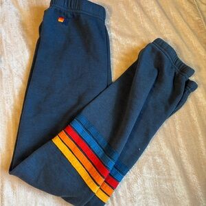 Aviator Nation Navy Sweatpants with Red, Yellow, Orange & Blue Stripes